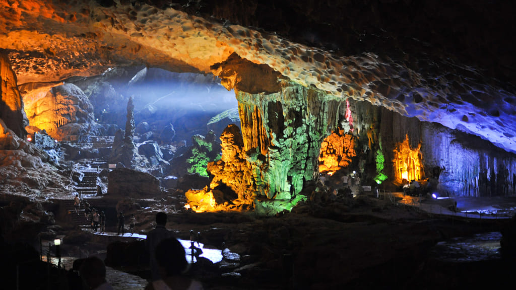 Visit caves in Halong Bay