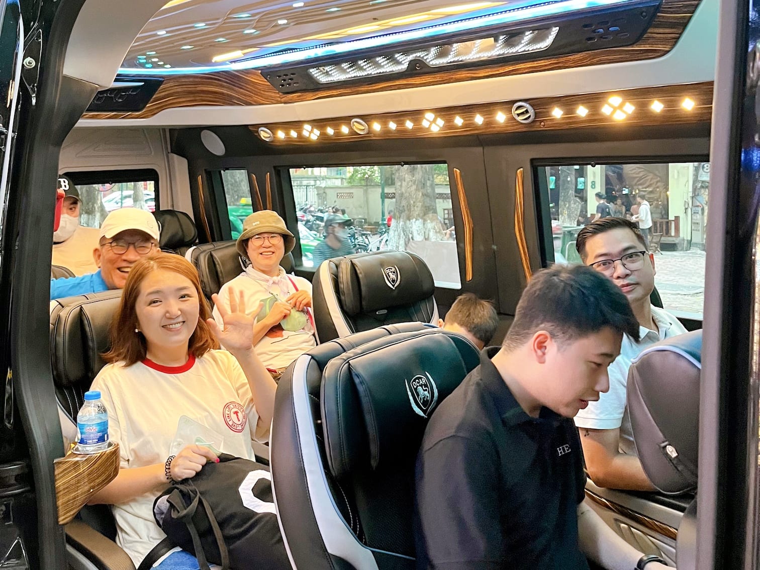 Tourists experience travelling to Halong Bay by shuttle bus